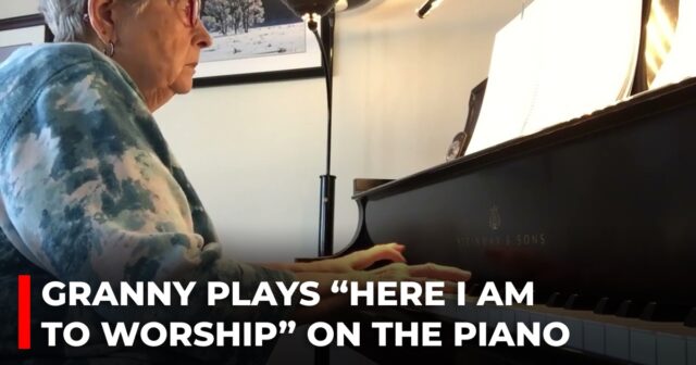 Granny plays “Here I am to worship” on the piano